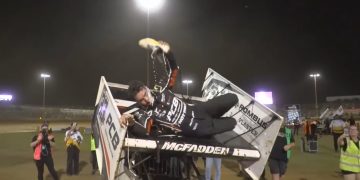 James McFadden slips from the wing of his Sprintcar after taking victory in the Grand Annual Sprintcar Classic.